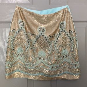 Francesca’s gold/mint sequin cocktail skirt.